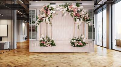 Arch for the wedding ceremony, decorated with white and pink flowers. Wall mural