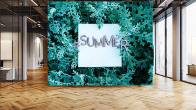 hashtag summer word text on the leafs and flowers background with white square frame Wall mural