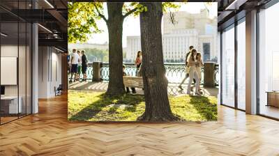 public summer park under the sunshine with the walking people Wall mural