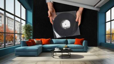 top view of music lover holding vinyl music record Wall mural