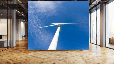 Wind turbine with blue sky - renewable energy Wall mural