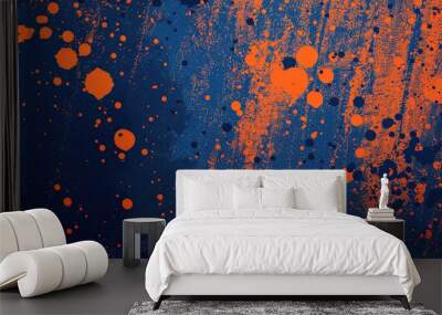 Abstract splattered paint in blue and orange hues Wall mural