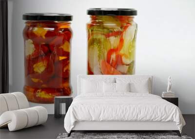 Pickles peppers tomatoes carrots chili homemade food in vase isolated at white Wall mural