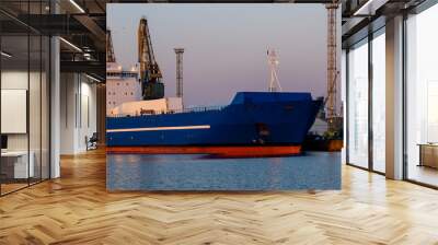  bulk cargo ship at the port quay on a beautiful sunny morning Wall mural