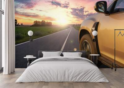 modern SUV on the German road at sunset Wall mural