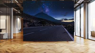 Night mountain road .Night sky with milky way and stars. Wall mural