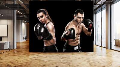 Boxing concept. Sports betting. Design for a bookmaker. Download banner for sports website. Two boxers isolated on a black background. Wall mural