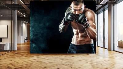 Sportsman boxer fighting on black background. Copy Space. Boxing sport concept. Wall mural