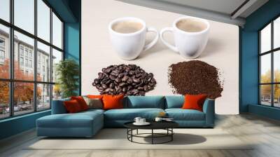 Two coffee cups or mugs with beans and ground coffee on wooden desk or table, I like, love coffee, close-up, coffee making concept Wall mural