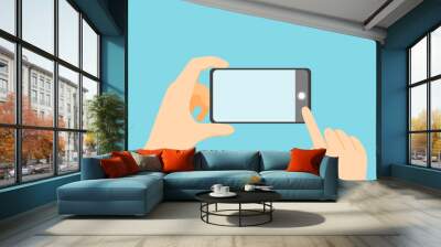 Mobile phone with a blank screen in hand Wall mural