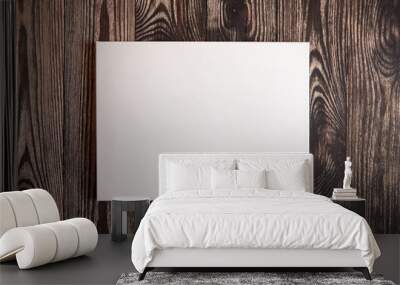 White blank cotton canvas on brown wooden background. Mockup Wall mural