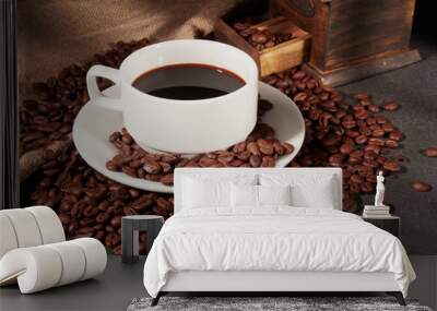 Coffee cup and coffee beans on the table Wall mural