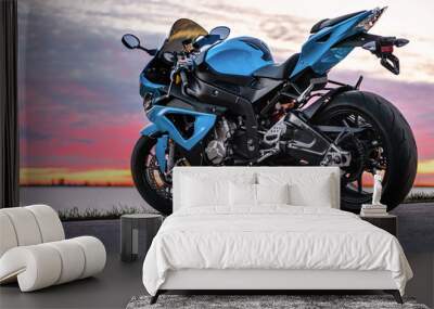 Sports motorcycle on the shore at sunset Wall mural