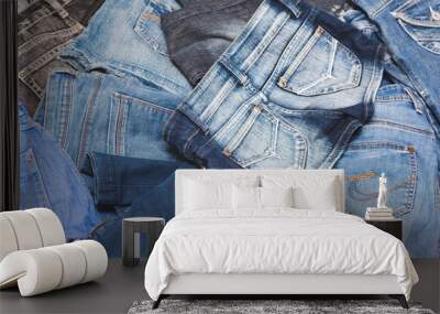 denim clothes and denim shorts is randomly lying on the floor Wall mural