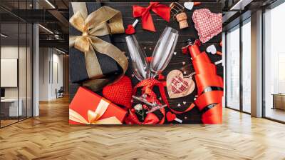 concept for valentine's day. gala dinner for two with two glasses of champagne. background with the attributes of the celebration of Valentine's Day. dominant red color. studio shot, top view. Wall mural