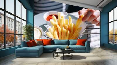 fast food. chicken wings in crispy batter. delicious and juicy appetizing food in a fast food cafe Wall mural