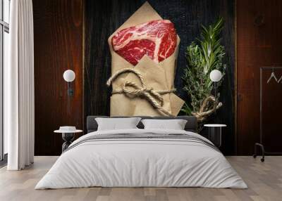 fresh rib-eye steak with rosemary, ready for frying. Wall mural