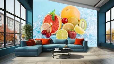 juicy fresh fruit on ice. concept of cool drinks in the summer heat Wall mural