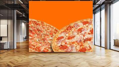 promotional set of two pizzas on an orange background. concept for stock pizza menu Wall mural