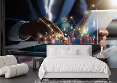 Businessman analyzing sales data on devices for strategic digital marketing innovation Wall mural