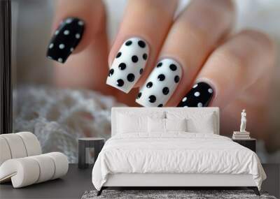 Create trendy black and white gel nails with fun polka dot design for a playful and stylish manicure Wall mural