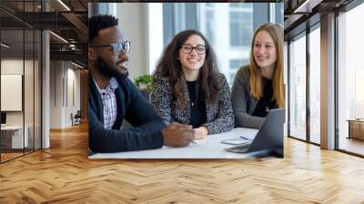 Diverse team collaborating in office to address business challenges and foster innovation Wall mural