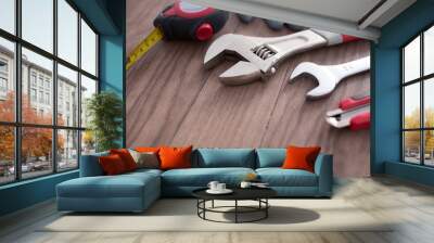 Working tools on wooden background Wall mural