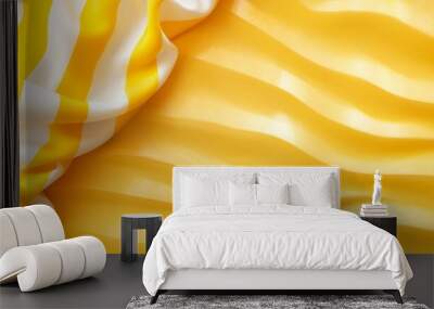  A close-up of a yellow and white background with wavy lines at the bottom The image below features a yellow and white stripe design at its base Wall mural