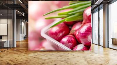  A mound of red onions atop two piles of green onions nearby Wall mural