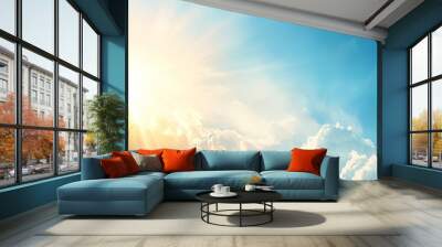  A radiant sun penetrates blue clouds, scattering white foreground clumps Wall mural