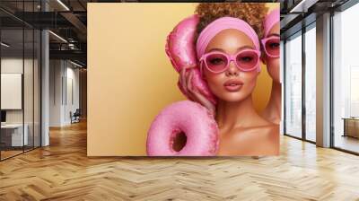  Two women stand close, donuts in hand, sporting pink sunglasses Wall mural