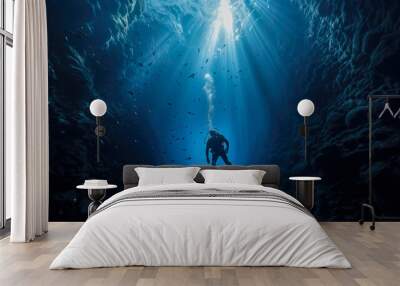 Scuba diving in deep blue sea with sunlight Wall mural