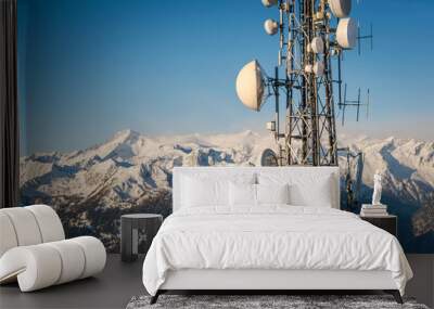 Tv/ Radio Antenna in the Italian Alps infront of snowy mountains Wall mural