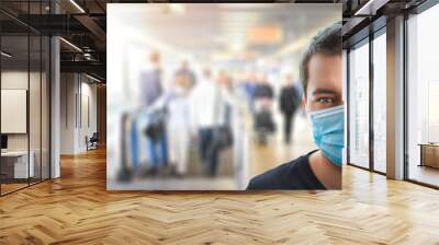 Airport young man tourist taking a flight in China wuhan wearing face mask. Coronavirus flu spread concept wide banner virus panorama Wall mural