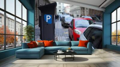 Automatic car parking pay station in the middle of city centre street Wall mural