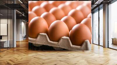 Egg. Fresh Chicken brown eggs in box.  Eggs on wood table. Wall mural