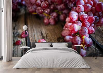 fresh organic red grape on old wooden vintage table Wall mural