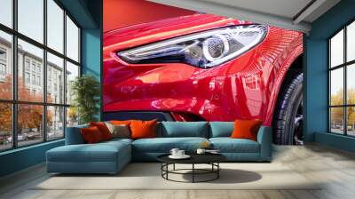 Headlight of red modern car with LED light Wall mural