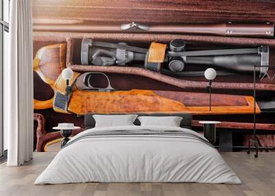 Hunting rifle unfolded or demounted in modern case. Sniper gun close up of optics telescope for wild hunting use wooden design.. Wall mural