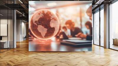 Image of a digital globe with a network overlay on a table in an office. Blurred people in the background suggest a collaborative work environment, showcasing technology and connectivity. Wall mural