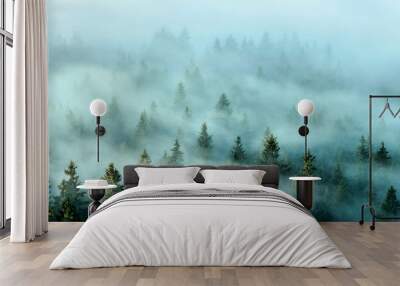 Misty mountains with fir forest in fog. Foggy trees in morning light. Wall mural