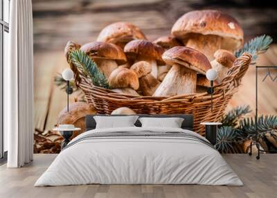 Mushroom Boletus in wooden wicker basket. Autumn Cep Mushrooms. Boletus edulis over Wood Background, close up on  rustic table. Cooking delicious organic deliciou food mushroom. Wall mural