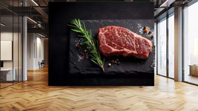 raw beef steak on a black stone plate Wall mural