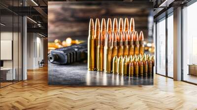 Various kind of bullets or ammonution on dark stone table. Bullet pile in war ammo background. Magazines, rounds and military technology. Banner or panorama guns photo.. Wall mural