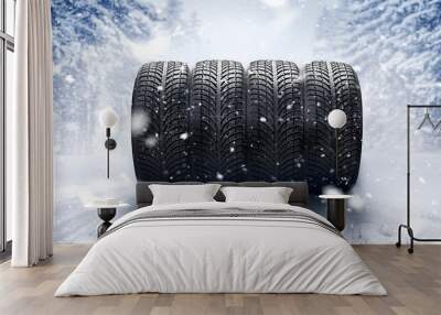 Winter tires on snow road. Wall mural