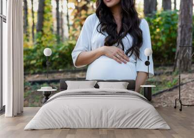 Close up of the pregnant woman's belly Wall mural