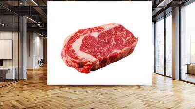 A rib eye steak of marbled grain-fed beef lies on a white background. Isolated. Wall mural