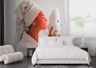 Woman Getting A Led Light Facial Mask Treatment At The Beauty Salon Wall mural