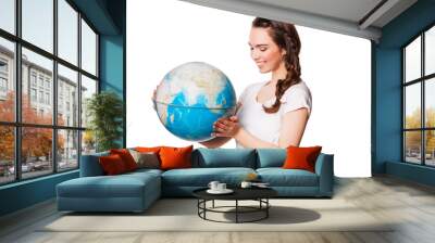 pretty smiling young lady holding a world globe. isolated on Wall mural