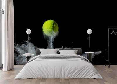 tennis ball on black background. concept photo of chalk dust from hitting the line Wall mural